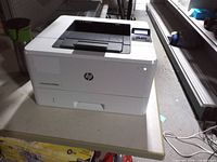 Front view of HP LaserJet Pro M404n printer