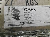 Box label showing OMAR shelving unit details in multiple languages