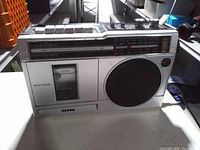 Front view of ION Retro Rocker showing cassette deck, speaker grille, control panel