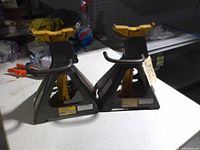 Two jack stands on work surface showing overall form