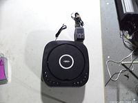 Top view of Jensen clock CD player with adapter cord