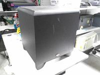 Front view of Klipsch subwoofer showing badge and cabinet condition