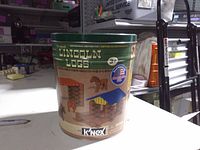 Front of tin showing branding and product information