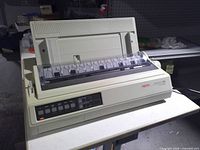 Full view of Okidata Microline 321 printer on table