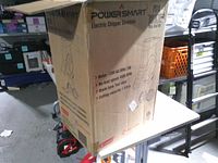 Outer carton showing model information and specifications