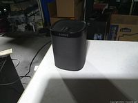 Front and side view of Sonos Play:1 speaker