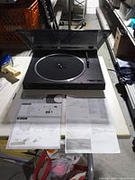 Technics turntable with documents displayed
