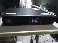 Front view of Vertiv UPS with LCD display