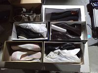 Overview of six shoe boxes showing all pairs