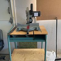 Full view of Delta miter saw on stand