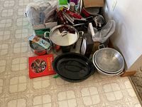 Entire lot showing cookware, utensils, cookbook