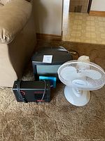 Overall lot showing TV, fan and heater