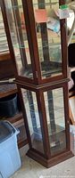 Lower section and base of curio cabinet