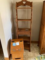 full view of narrow shelf and storage bin together