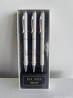 Front view of boxed Rae Dunn 3-pen set