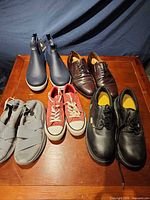 All five pairs arranged on wooden surface