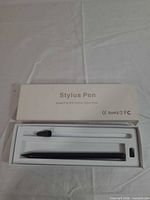 Boxed stylus pen with inner tray showing pen and spare nib