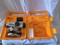 Automatic level with accessories in orange case