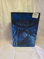 Front cover of book with dust jacket and price sticker