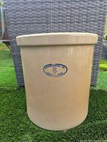 Full view of crock front showing oval blue stamp and rolled rim