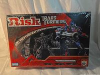 Front view of sealed Risk Transformers Cybertron Battle Edition game box