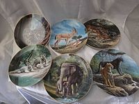 All six wildlife plates arranged for full lot view