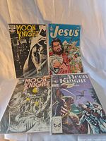 Group shot of all four bagged comics