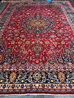 Full view of rug showing central medallion and entire pattern