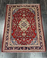 Full view of handmade Hamadan rug showing entire pattern and borders