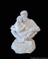 Front view of white resin Holy Family statue