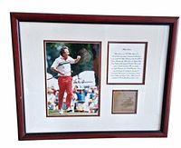Front view of framed signed Hale Irwin photo with text plaque and inset image