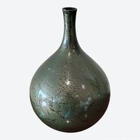 Studio image of bronze bulbous vase showing patina and form