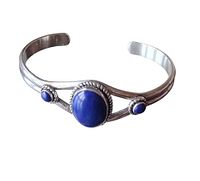 Full view cuff bracelet, stones and split shank visible