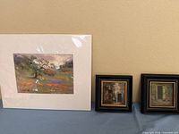 All three artworks together: Erickson print matted, two smaller framed paintings