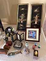 Group shot shows all items including panels, framed art, panda plate, figurines, screen, cloisonné, boxes