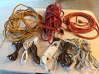 Tabletop view showing all eight extension cords coiled