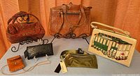 Group shot of all six handbags and pouches