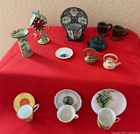 All 15 items grouped on red cloth