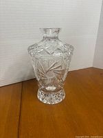Front view showing starburst cut design and full vase shape