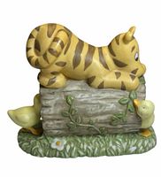 Side view showing Tigger on log with two ducklings and base details