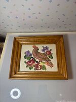Framed cross stitch artwork front view showing entire piece