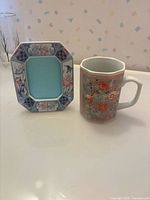 Mug and tray/frame together showing shapes and patterns