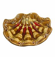 Full view of scalloped ceramic dish showing overall color and shape