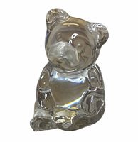 Front view of clear crystal seated bear
