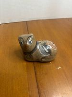 Front view of hand-painted Tonala-style ceramic figurine