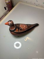 Top view showing overall bird shape and painted design