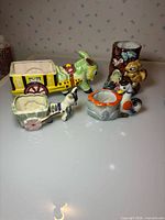 Group shot of all four ceramic animal planters