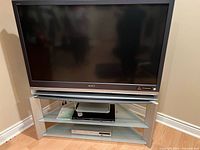 Front view of Sony TV on included stand