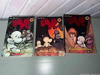 Front covers of the three Bone paperback graphic novels