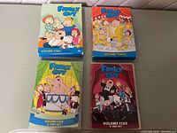 Front view of four Family Guy DVD sets Volumes Two to Five
